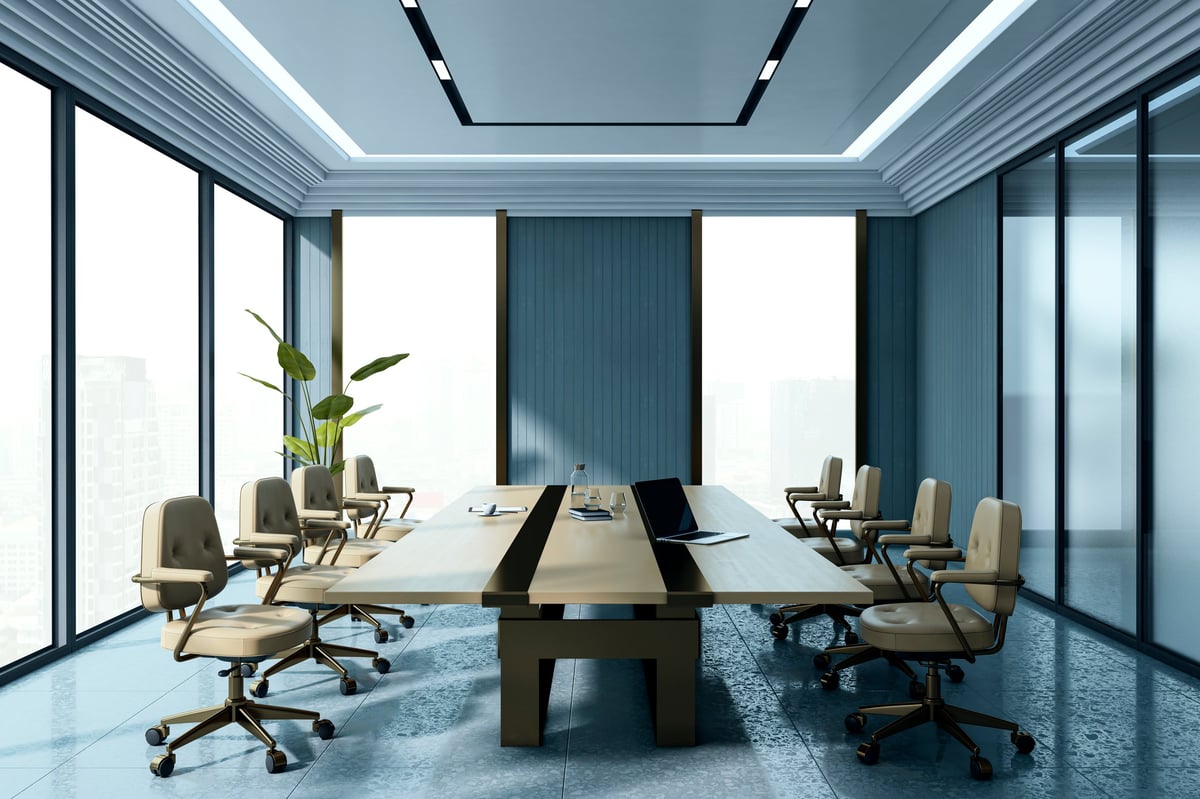 Modern conference room with sleek furniture and natural lighting