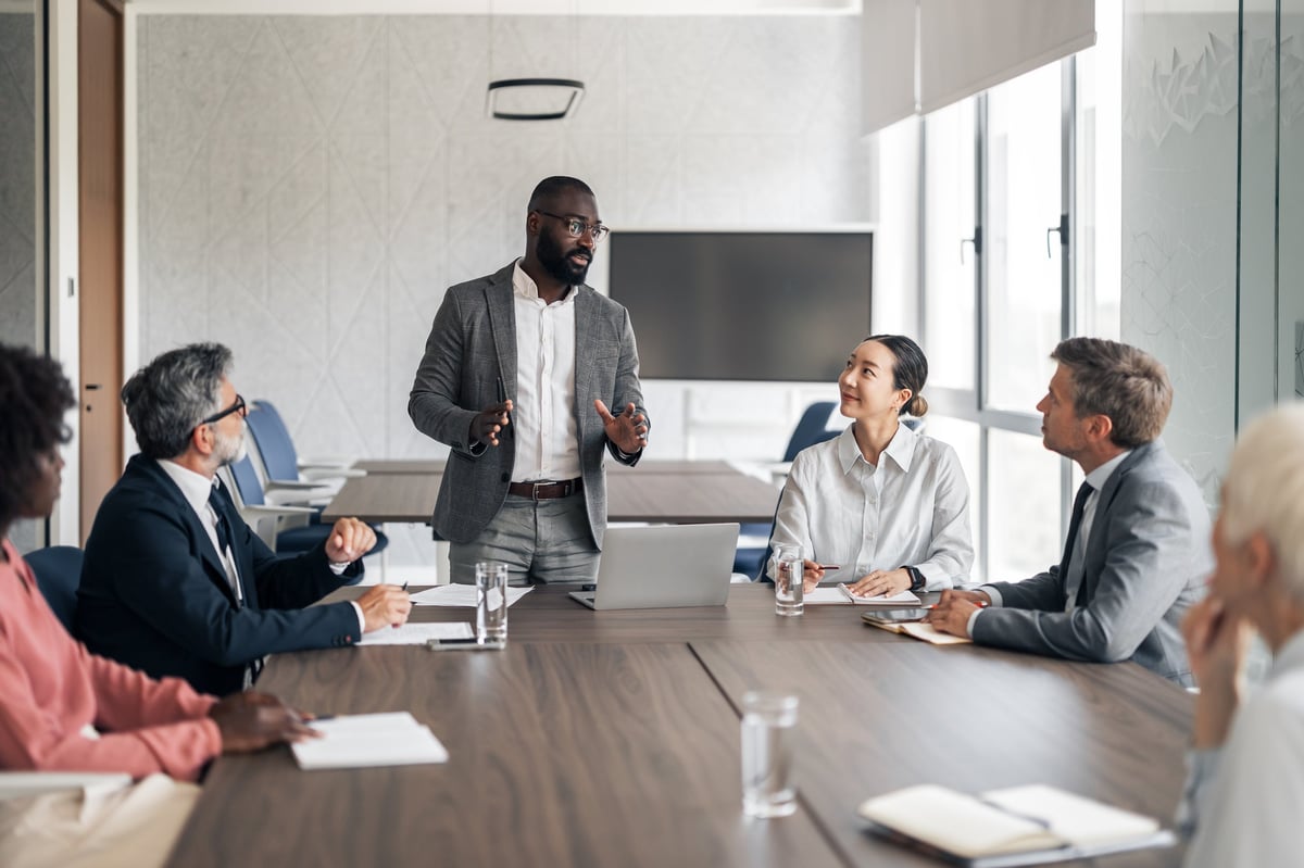 Professional business meeting in modern boardroom