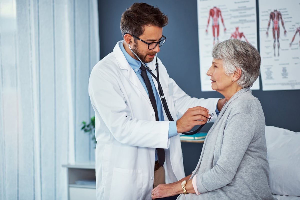 Doctor consulting with patient in professional clinic setting